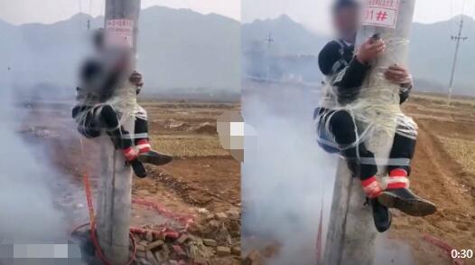 新郎被绑电线杆身下挂燃放鞭炮 为什么这样做意义何在?