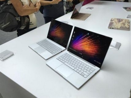  macbook与小米笔记本「小米笔记本和macbook pro」-图2
